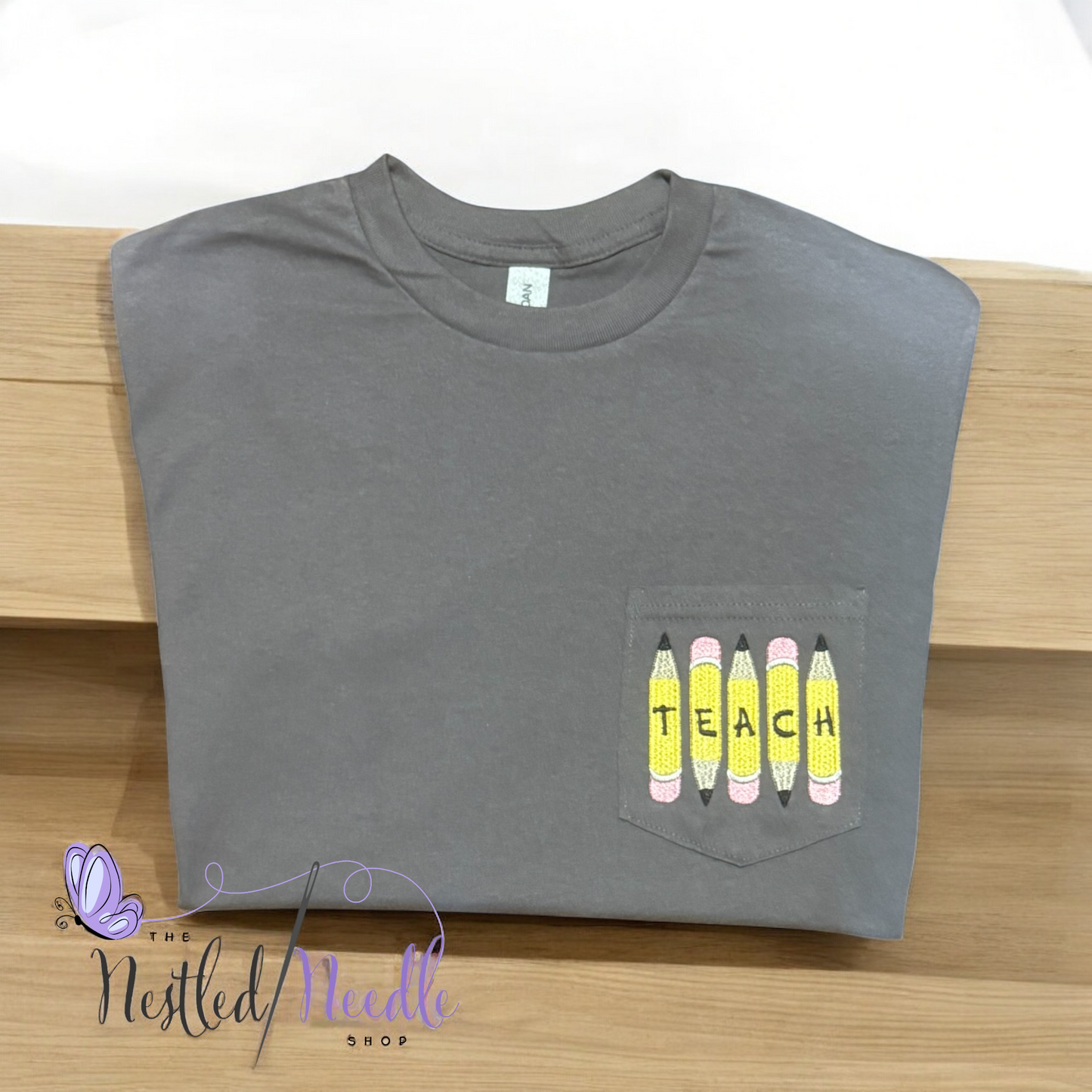 Women's Pencil "TEACH" Pocket Tee